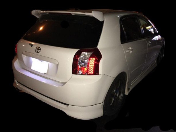 Накладки-уши на спойлер "C-One" Toyota Corolla Runx / Allex купить недорого с доставкой в Рыбинск