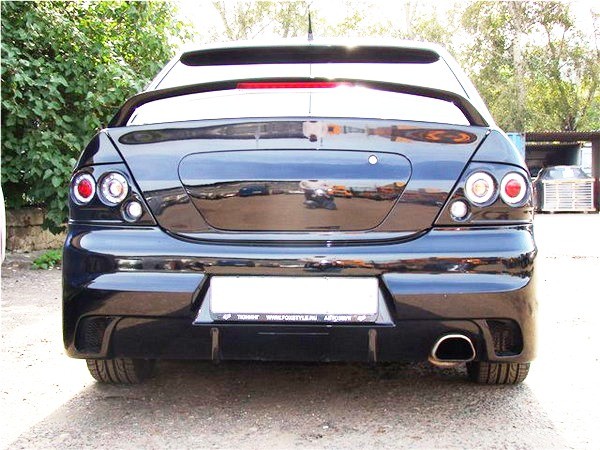 Бампер задний в стиле "EVO" для Mitsubishi Lancer IX (2003-2009) купить недорого с доставкой в Рыбинск