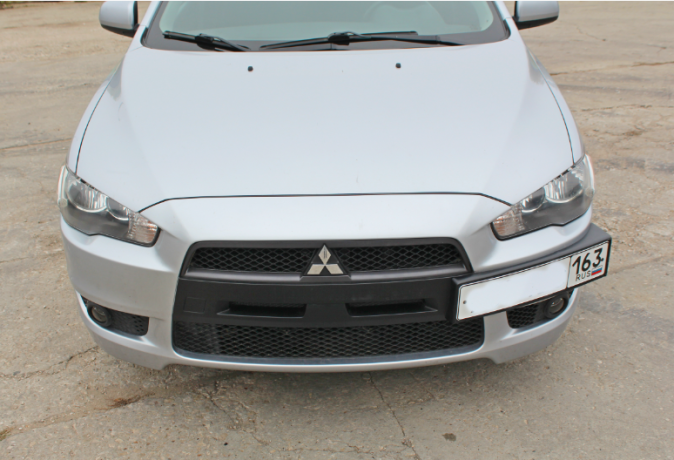 Рамка под номер на передний бампер для Mitsubishi Lancer X (2007-2016) купить недорого с доставкой в Рыбинск